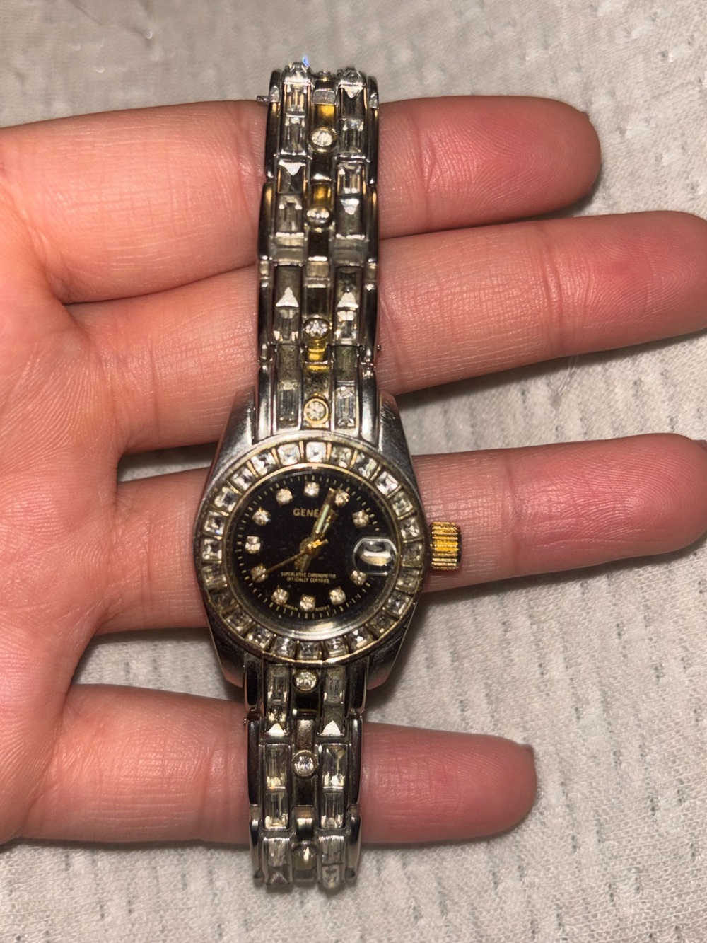 Geneva Women's Silver and Gold Crystal Bracelet Watch with Black Dial
